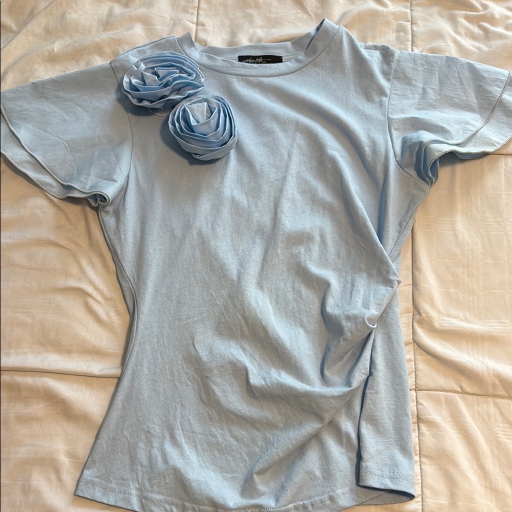 Light Blue T-Shirt with Floral Accents